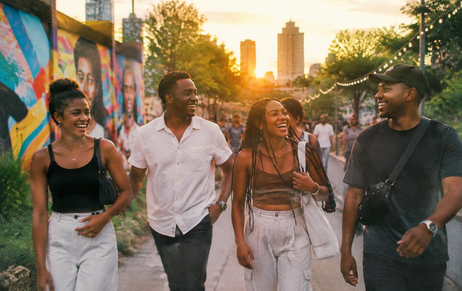 Friends walking together at golden hour